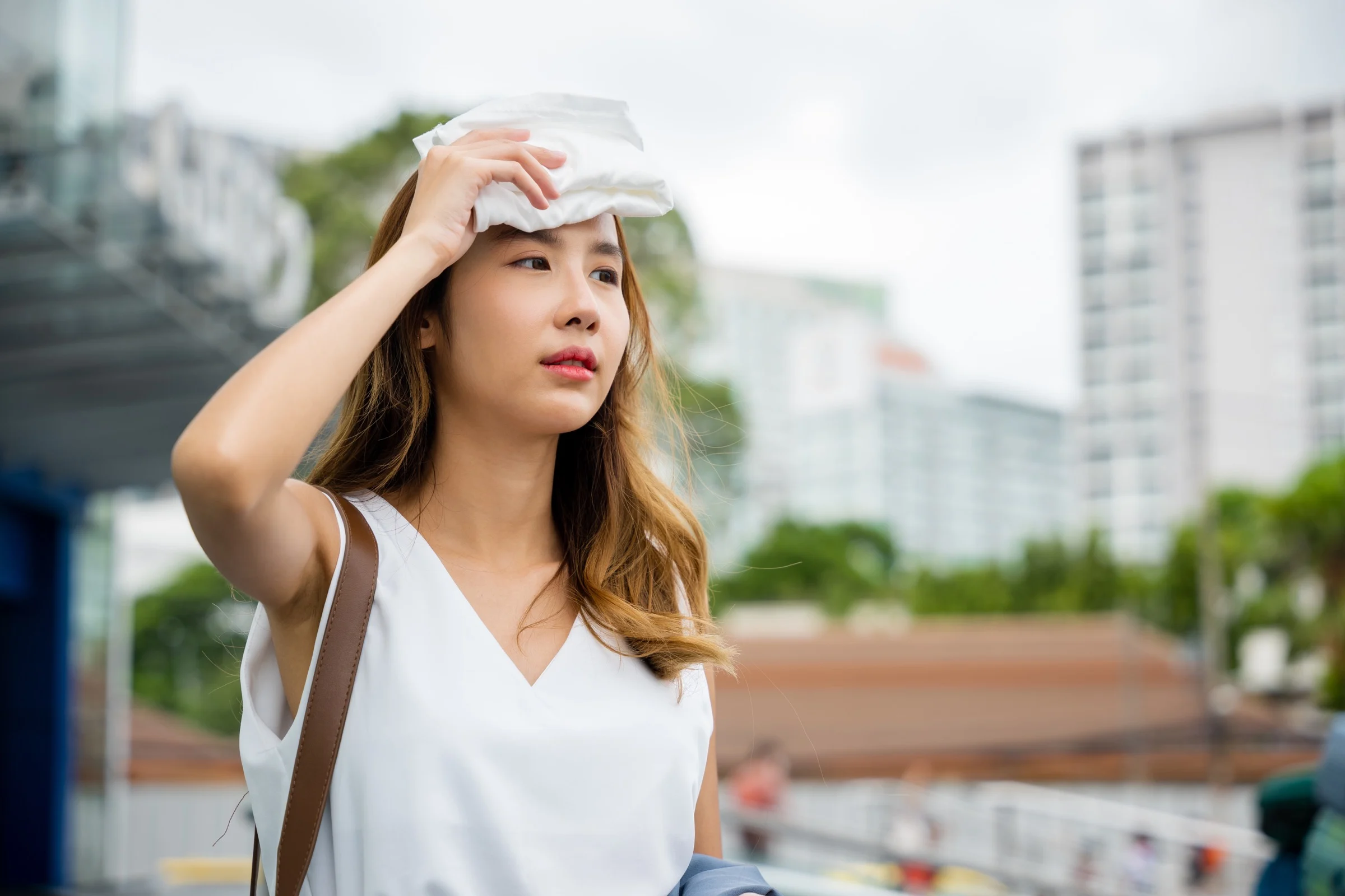 Angry Female Having Sunstroke Skin Damage From Sun Uv City Air Pollution Outside Street Overheating Asian Beautiful Business Woman Drying Sweat Her Face With Cloth Warm Summer Day Hot Weather